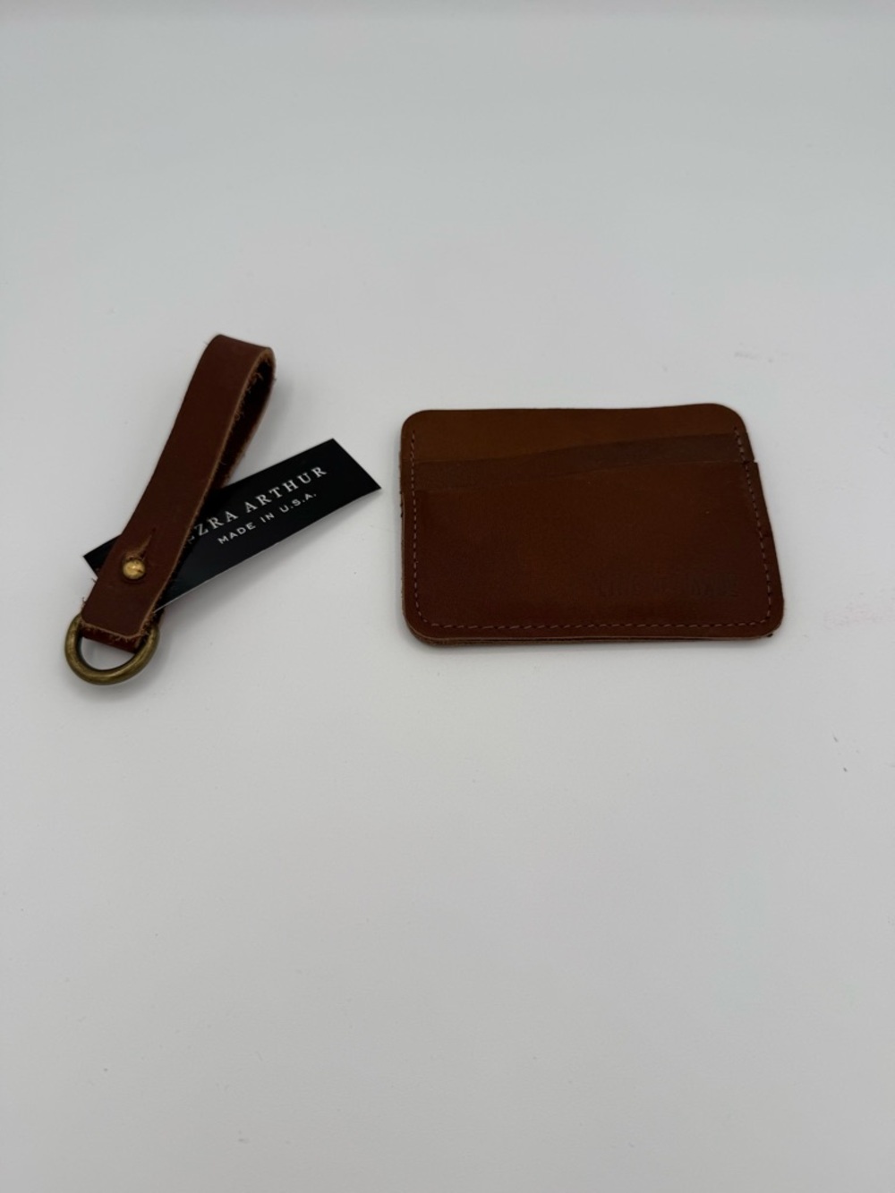 Line of Trade Leather wallet and Ezra Arthur Leather keychain.